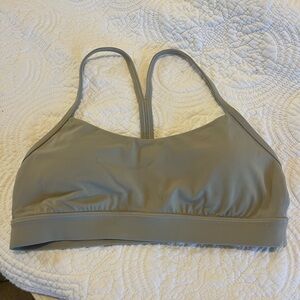 Lululemon Flow Y sports bra in gray/taupe color, size 8